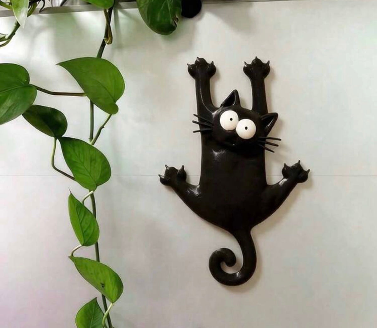 Hanging On for Dear Life Black Cat Fridge Magnet
