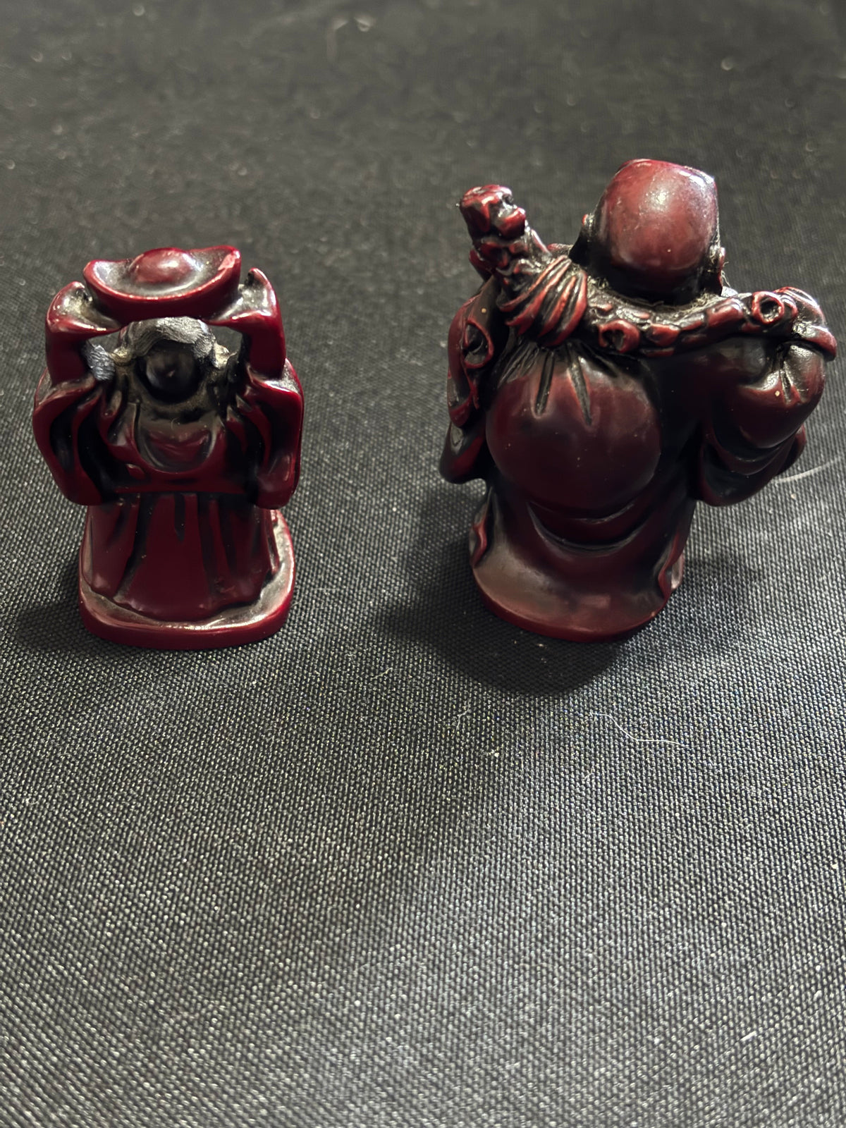 Pair of Miniature Oxblood Red Laughing Buddha Figurines